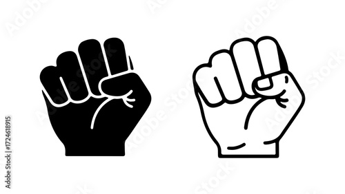Two clenched fists black and white focused on protest and strength.