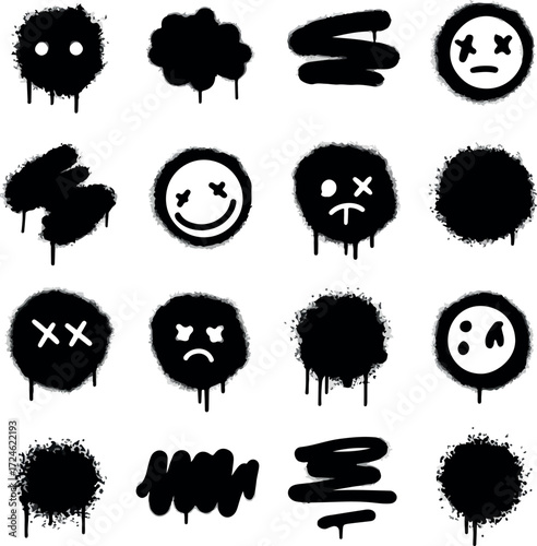 Spray paint art featuring various graffiti style faces and shapes.