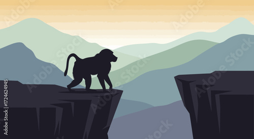 Silhouette of a Baboon Standing on a Cliffside Overlooking a Mountain Range.