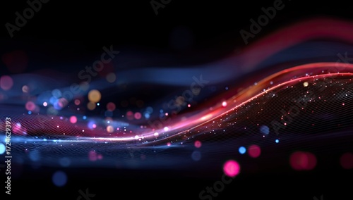 Abstract digital waves with glowing particles.  Dynamic, flowing forms