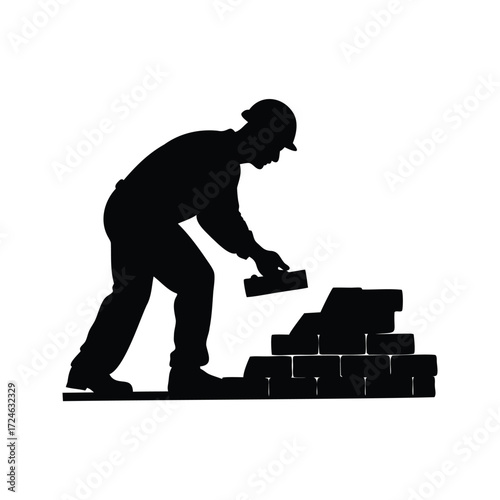 Silhouette of bricklayer constructing a brick wall wearing a hard hat, worker laying bricks silhouette vector illustration