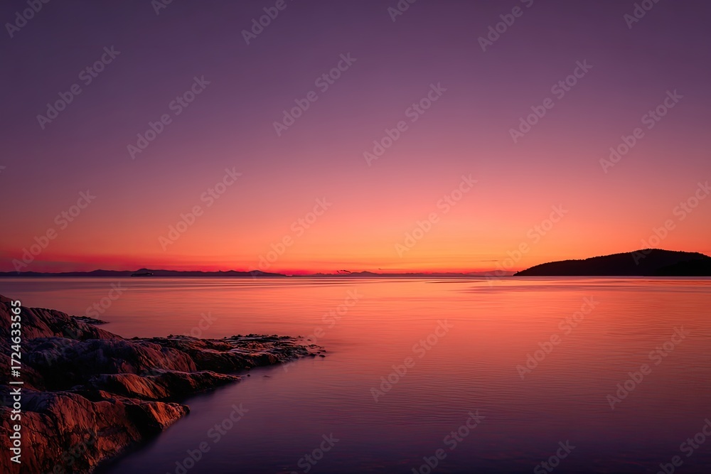 Obraz premium Serene sunset over a calm lake