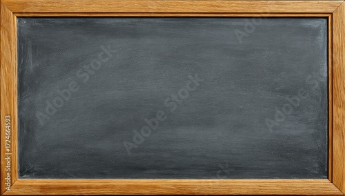 Empty dark gray slate blackboard in a light brown wooden frame