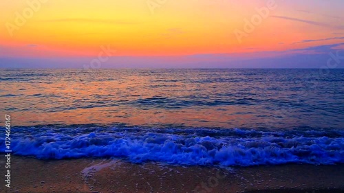 Beautiful summer sunrise over the beach