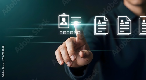 A person interacting with digital cv icons and checklist on a dark background interface screen
