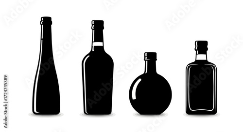 Set of four dark glass bottles different shapes for liquor or artisanal beverages isolated studio shot vector
