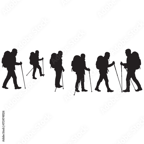 Group of hikers with backpacks and poles in a line