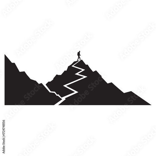 Hiker ascending a mountain on a winding zigzag path