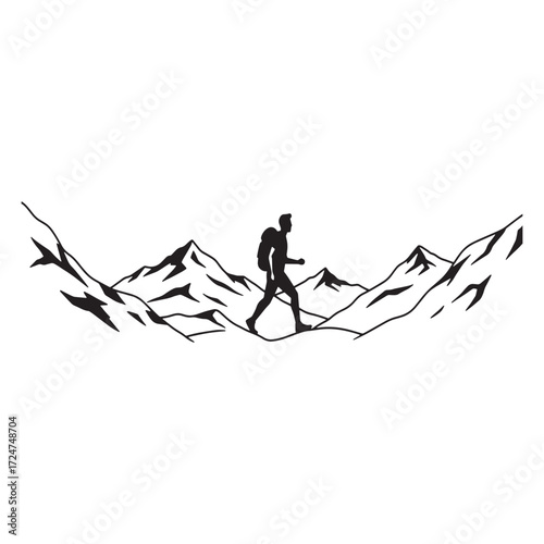 Hiker walks through a mountain pass with jagged peaks