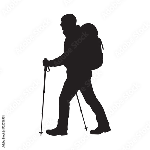 Silhouette of a hiker with backpack and trekking poles