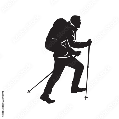 Silhouette of a hiker with backpack and trekking poles