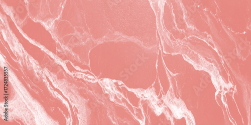 A soft dusty rose or coral-pink background with a subtle, polished appearance White, vein-like patterns swirl marble.