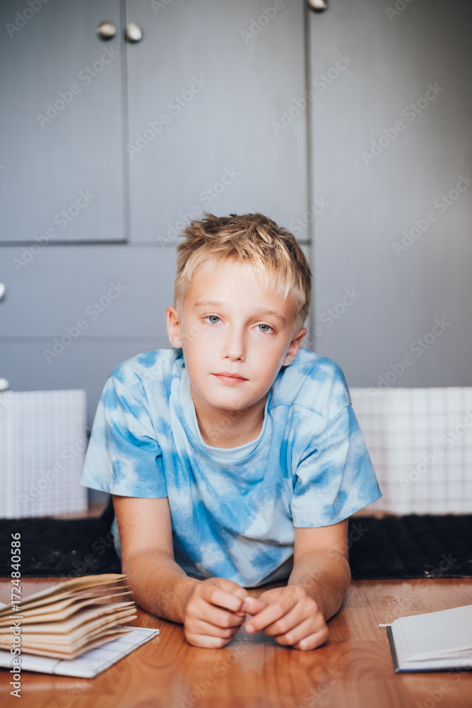 Naklejka premium handsome boy with blue eyes, blond