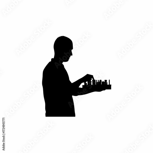 Silhouette of lab worker arranging labeled blood samples in tray isolated on white background
