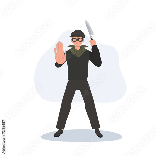 criminal thief burglar masked man holding knife