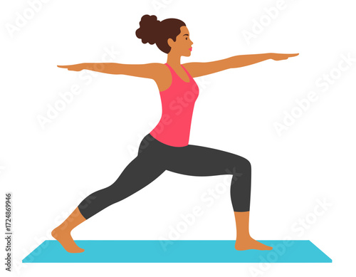 Woman performs the Warrior II yoga pose standing on a blue mat demonstrating fitness and balance strength.