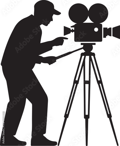 Filmmaker silhouette operating vintage movie camera on tripod capturing a scene