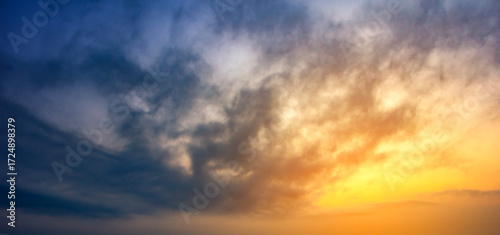 Sunset sky with clouds. Panoramic view of the sky.