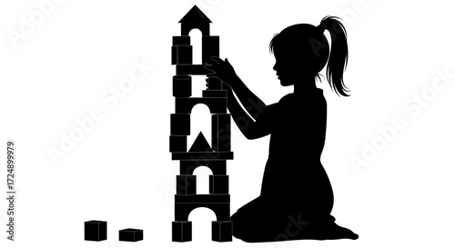Playful Innocence Silhouette of a Female Child Joyfully Building a Tall Block Tower