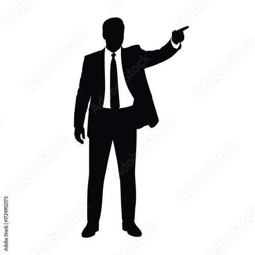 Silhouette of a businessman pointing forward with determination