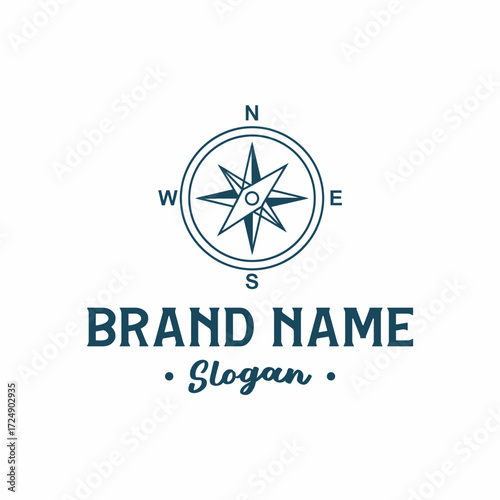 Vintage style compass rose logo with brand name and slogan.