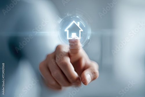 A hand points to a glowing house icon projected onto a surface