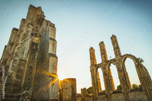 Ruins of Abbaye Saint Bertin in Saint Omer France, medieval Gothic abbey remains at sunset, historic architectural heritage landmark and cultural tourism destination in northern France.