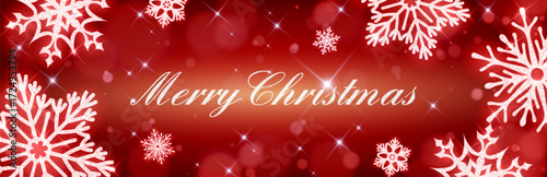 Silver glitter snowflake banner with Merry Christmas text on red bokeh bg for holiday greetings. Festive design with sparkles, white crystal patterns and elegant congratulation for seasonal card