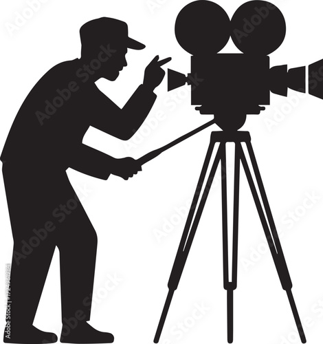 Silhouette of a filmmaker operating a vintage movie camera on a tripod creating cinematic art.