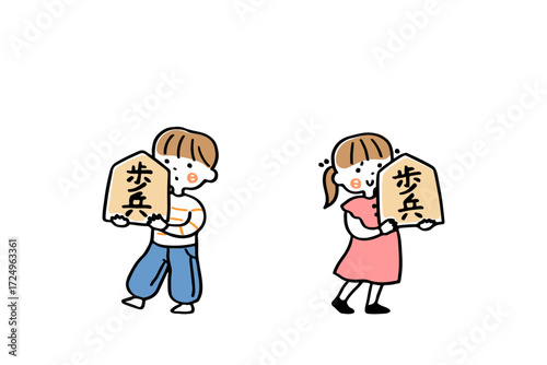 大きな将棋の駒を持つ男の子と女の子（歩兵）