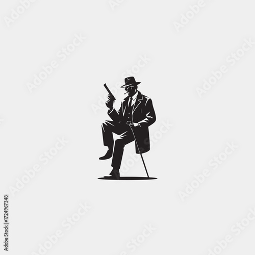 Silhouette of a man in a suit and hat holding a gun