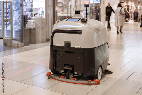 modern electric Floor Cleaning Machine in shopping mall, concept of cleanliness and cleaning large floor area