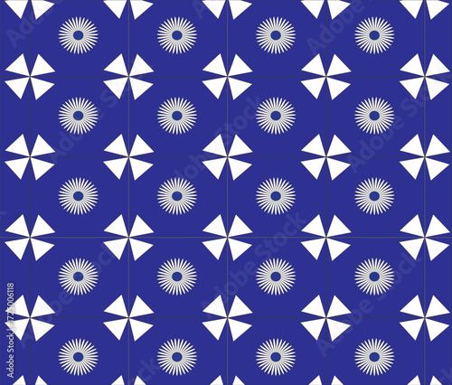 Seamless geometric pattern with alternating sunburst and pinwheel shapes on blue. Ideal for modern backgrounds, textiles, wallpapers, and abstract design projects.