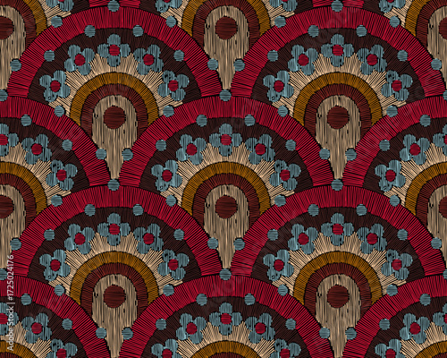 Seamless pattern inspired by embroidery. Stylized floral and sunburst motifs. Bold geometric composition. Retro textile design. Vector illustration.