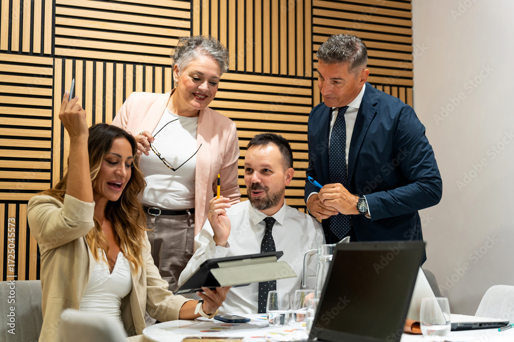 Fototapeta premium Business team collaborating on project in modern office