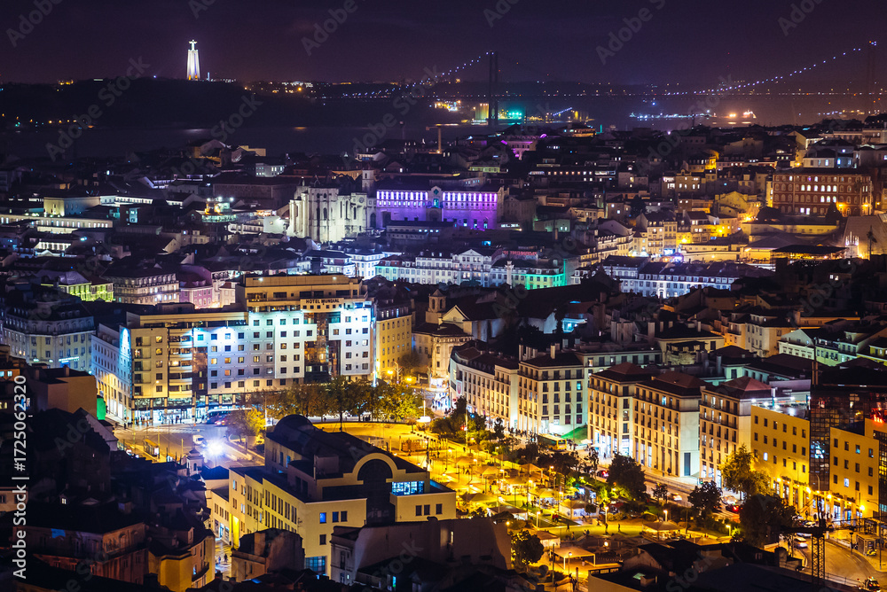 Fototapeta premium Evening view from Nossa Senhora do Monte viewing point on Martim Moniz square in Lisbon city, Portugal