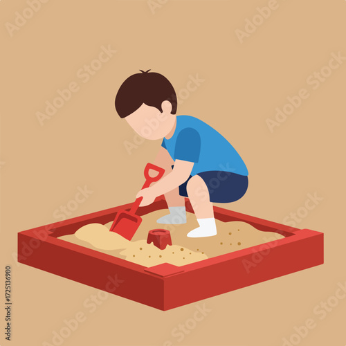 Boy plays in a red sandbox with a shovel, crafting a sandcastle