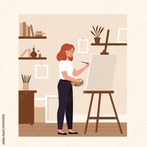 Woman painting on canvas in art studio with bookshelves and blank frames