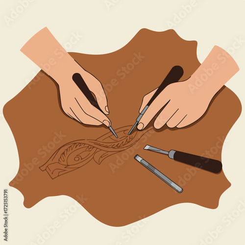 Hands carving a design into brown leather hide with chisels