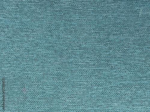 Blue and green texture cloth background. Fabric indigo color pattern, empty surface design