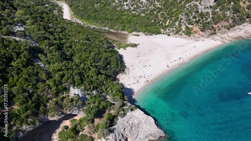 Aerial drone footage of Cala Sisine beach, Sardinia, Italy – turquoise sea and cliffs
