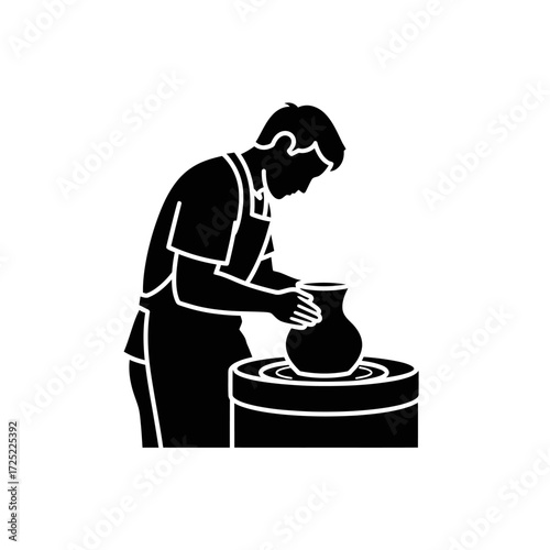 Skilled artisan shaping clay on a pottery wheel, creating beautiful ceramic art with focused precision and artistic talent.