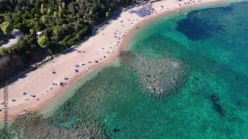 Aerial drone footage of Cala Gonone, Sardinia, Italy – turquoise sea and rocky cliffs