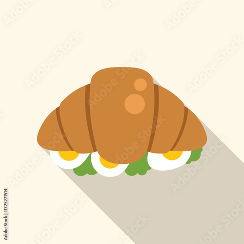 Croissant sandwich with eggs and lettuce creating a healthy breakfast option
