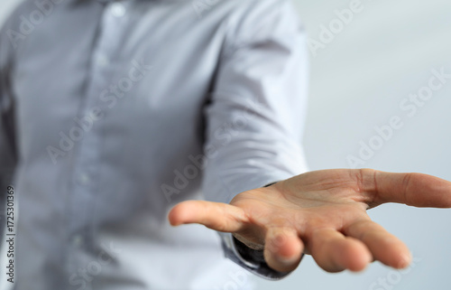 Image of an open hand, symb...