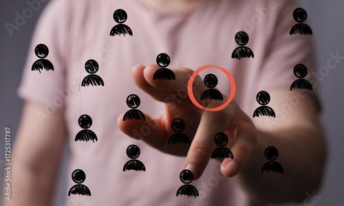 Hand pointing at a single p...