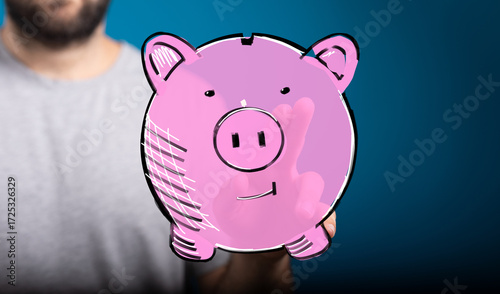 Image of a man holding a di...