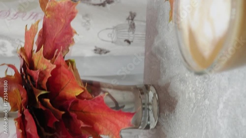 Autumn mood Harvest pumpkin autumn maple leaves red and yellow and coffee sleep Do you want to go to bed little. Thanksgiving and Autumn decoration concept made from autumn leaves and pumpkin
