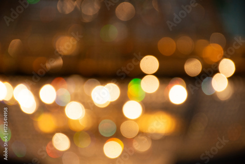 Moving blurred motion of colorful neon lightings and movement blur multicolor of ceiling antique modern light lamps of architecture building in Ayutthaya, Thailand