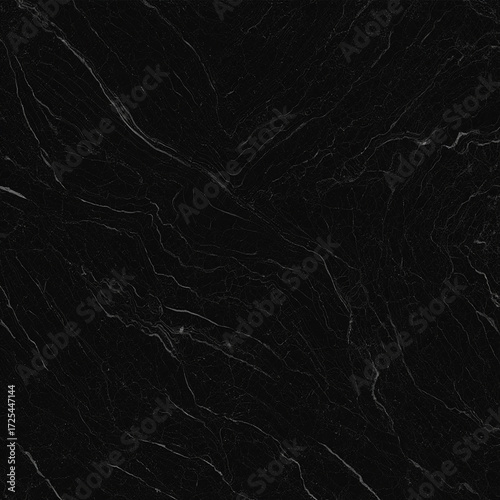 Photo of a dark, textured black marble surface with subtle white veining creating a natural, elegant pattern
